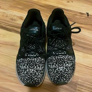 BCG black and white tennis shoes.